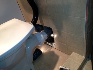 We dye tested the toilet in U103 to find it leaking into the unit below. We therefore removed 4 wall tiles and excavated the wall to locate the leak.