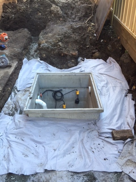 CMF Plumbing installed a submersible pump, float switches and control panel to pump the sub soil water seepage to the street.