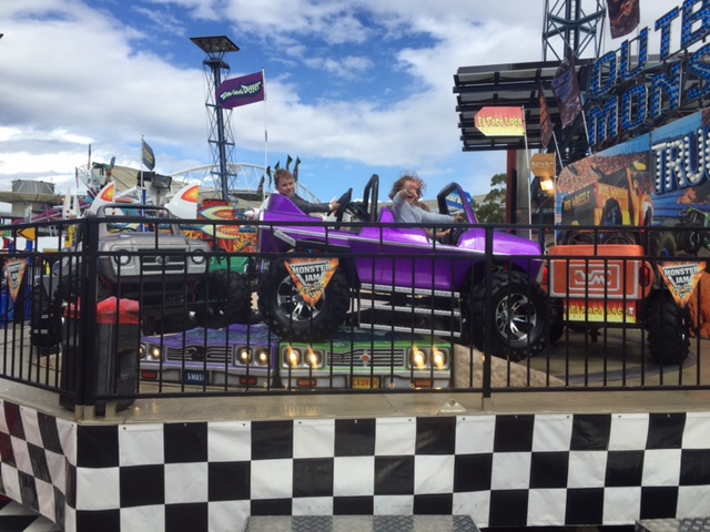 Harry, Marie on a kids ride at the show. 