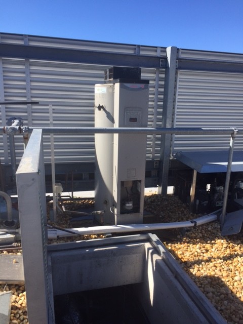 The old burst Rheem 275ltr natural gas heavy duty hot water unit on the roof of the Shanghai Stories Chinese Restaurant in Chatswood. 