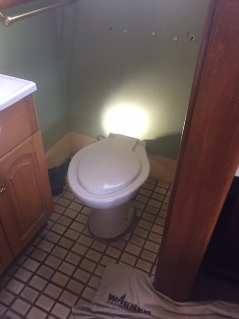 We removed the old toilet suite. 
