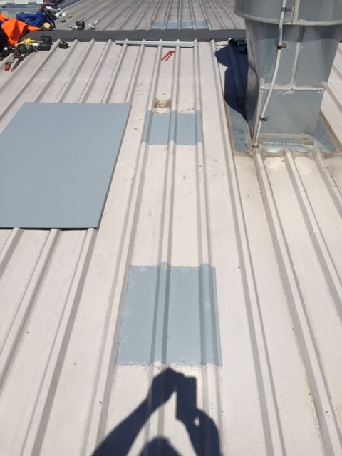 We sealed using roof sheets, silicone sealed and riveted over the metal roof penetrations. 