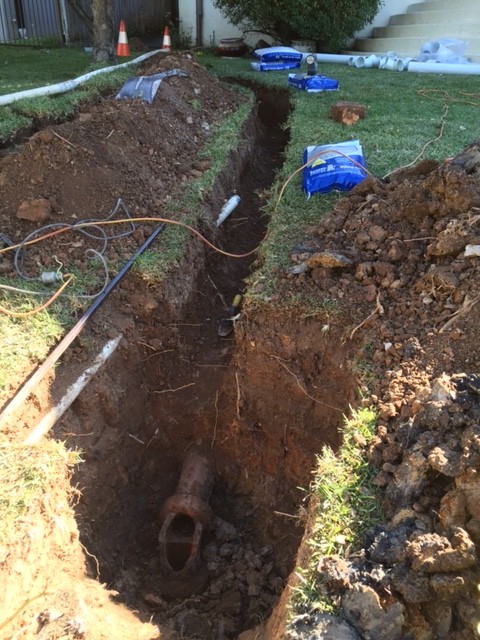 CMF Plumbing excavated by hand the existing damaged drainage.