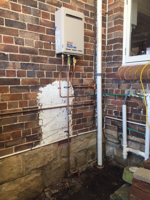 CMF Plumbing team removed an old leaking gas storage hot water unit and installed a Rinnai B26 gas instantaneous hot water unit.