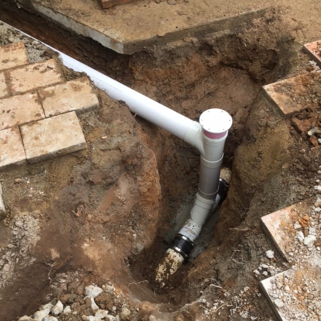 We cut a new junction into the existing sewer main line