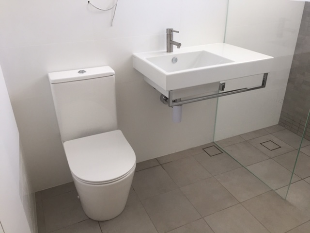 We roughed in new copper water pipes for the new toilet, basin and shower prior to tiling. We return once tiled to install the toilet suite, wall hung basin, shower head and wall mixer.