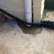 CMF Plumbing repair leaking downpipe at Ryde NSW